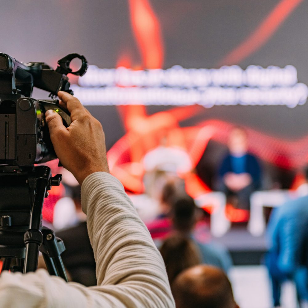 Television cameras at an IT Seminar